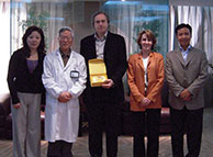 penenberg receving gift from china people